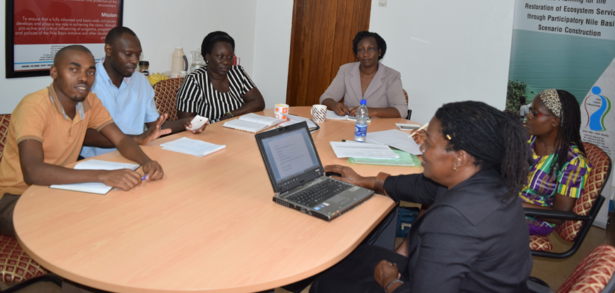 Part of Z-A Engineering Consulting team led by Ms. Elizabeth Kharono (right back) and the NBD Secretariat team led by Ms. Hellen Natu (right front), in discussions at the NBD Secretariat Office in Entebbe, Uganda. August 2016. Courtesy, NBD